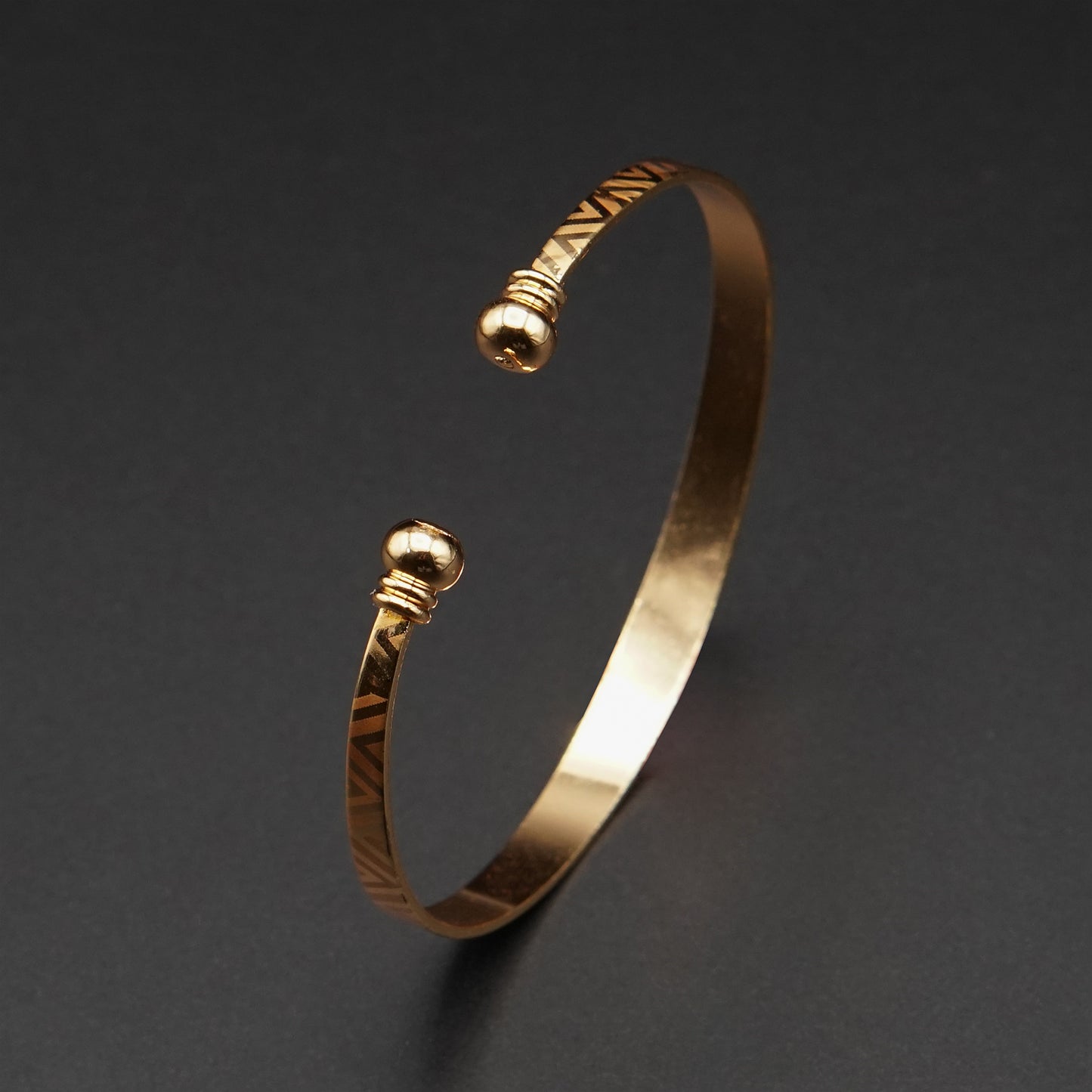 Geometric Patterned Gold-Toned Open Cuff Bangle