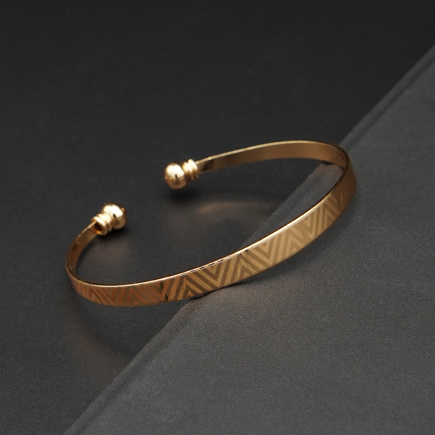 Geometric Patterned Gold-Toned Open Cuff Bangle