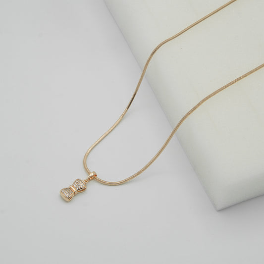 Elegant Gold and Diamond Bow Tie Pendant Necklace