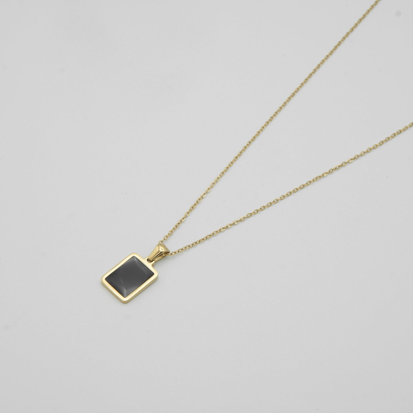 Elegant Gold Pendant Necklace with Black Onyx