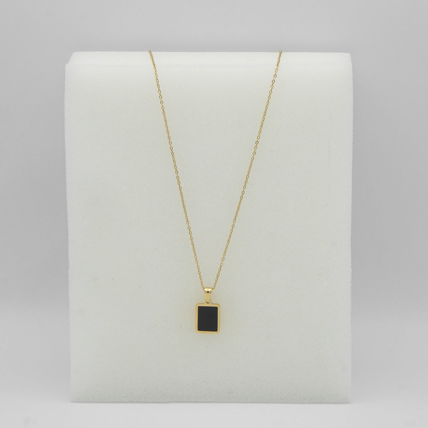 Elegant Gold Pendant Necklace with Black Onyx